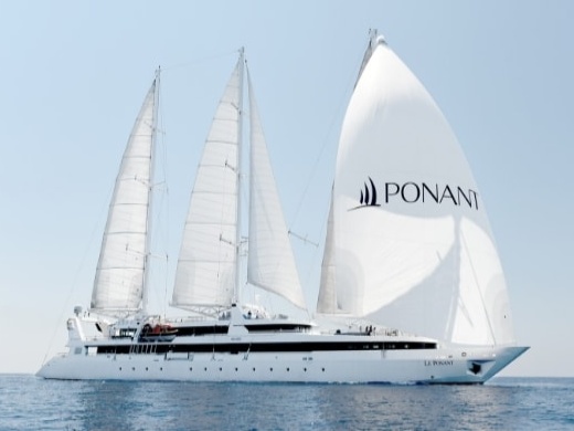 Ponant Le Ponant three-masted sailing yacht in calm blue waters
